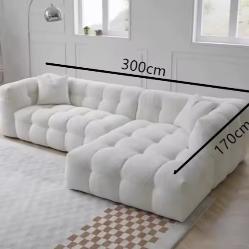 The Cloud Tufted Sofa: Decadent Comfort, Engineered to Last.