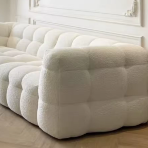 The Cloud Tufted Sofa: Decadent Comfort, Engineered to Last.