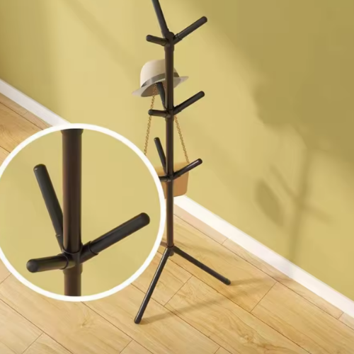 The Sentinel Coat Tree: Vertical Organization, Enduring Form.